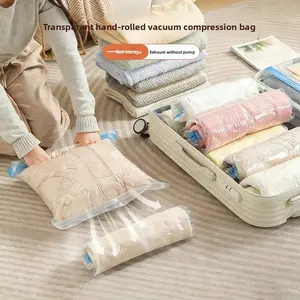 Transparent roll-type vacuum compression bag - a home-use travel clothes storage bag that eliminates the need for pumping air and keeps clothes dry during travel.AI·