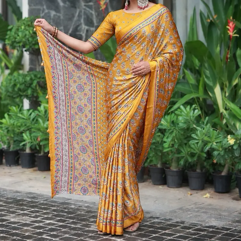 Modal Silk Ajrakh print saree with real mirror work,  Comes with a stitched blouse. Asian- Womenswear.