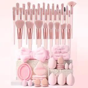 56 piece pink multifunctional makeup tool set, 32 makeup brushes, various sizes of beauty sponges, finger puff, silicone cleaning bowl, butterfly velvet headband and wrist guard, a complete makeup tool set suitable for beginners