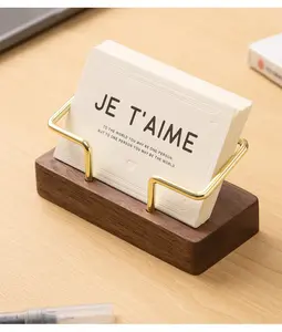 Includes shipping fee. High-end business card holder/display stand for front desk storage—creative desktop design.