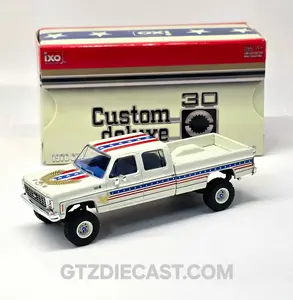 IXO Model 1:64 1976 Chevrolet Custom Deluxe K30 Fleetside 250th Anniversary Edition – White