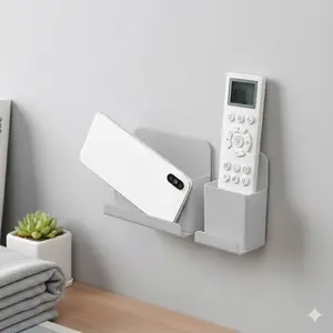 No-Hole Wall-Mount Remote Holder & Organizer, Phone Stand for TV/AC Remotes, Strong Adhesive Shelf, Anti-Slip Storage, Cord Management, Multipurpose Wall Stick Organizer for Living Room Bedroom Kitchen, Multifunctional Phone Stand