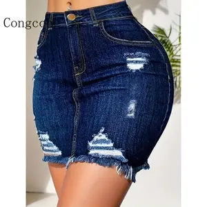 Distressed bodycon denim skirt with ripped raw hem, high waist, medium stretch, washed blue, slash pockets, and frayed trim; women’s denim jeans and clothing; womenswear bottoms; comfortable fabric; skinny fit