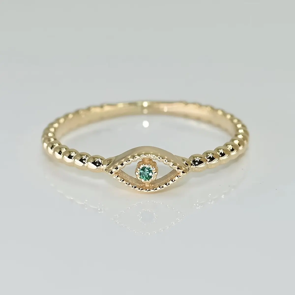 Exquisite thin-circle evil eye ring, with a slender and lightweight band. It's an elegant ring that can be stacked, a guardian ring, a bohemian-style lucky ring. It's a light luxury and niche design, a ring to give to your girlfriend.