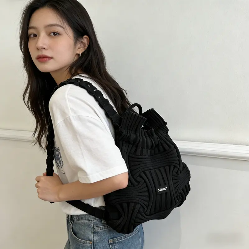 Fashion-Forward Pleated Drawstring Backpack, Textured Knit Bucket Bag with Ruffled Details, Casual Daypack for Women for Everyday and Travel