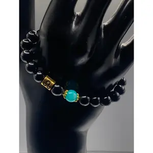 Leo Zodiac black obsidian with aquamarine chalcedony elastic beaded bracelet with gold accents