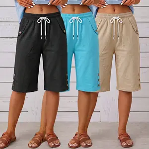 Women’s loose Bermuda shorts with an elastic waistband and drawstring design, casual knee-length length, featuring decorative buttons for comfortable everyday wear.