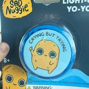 Cryingl but trying featuring sad nugget light up stress relief to
