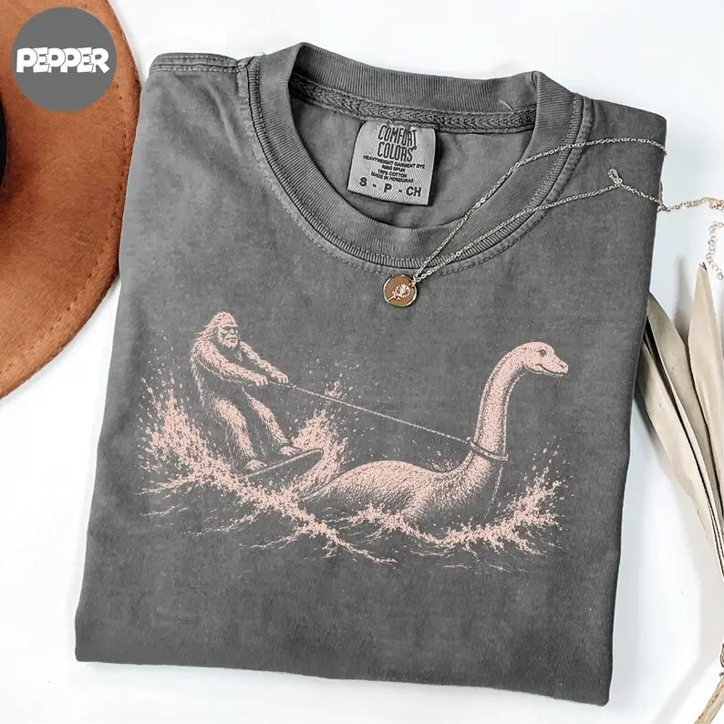 Comfort Colors Funny Bigfoot Loch Ness Monster T-Shirt, Cryptid Waterskiing Tee, Summer Sasquatch Gift