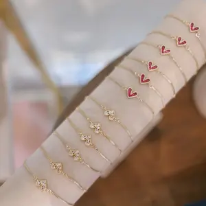 Adjustable Heart Rhinestone Bracelet - Elegant Gold-Tone Chain with Pink Heart Charms for Women's Fashion