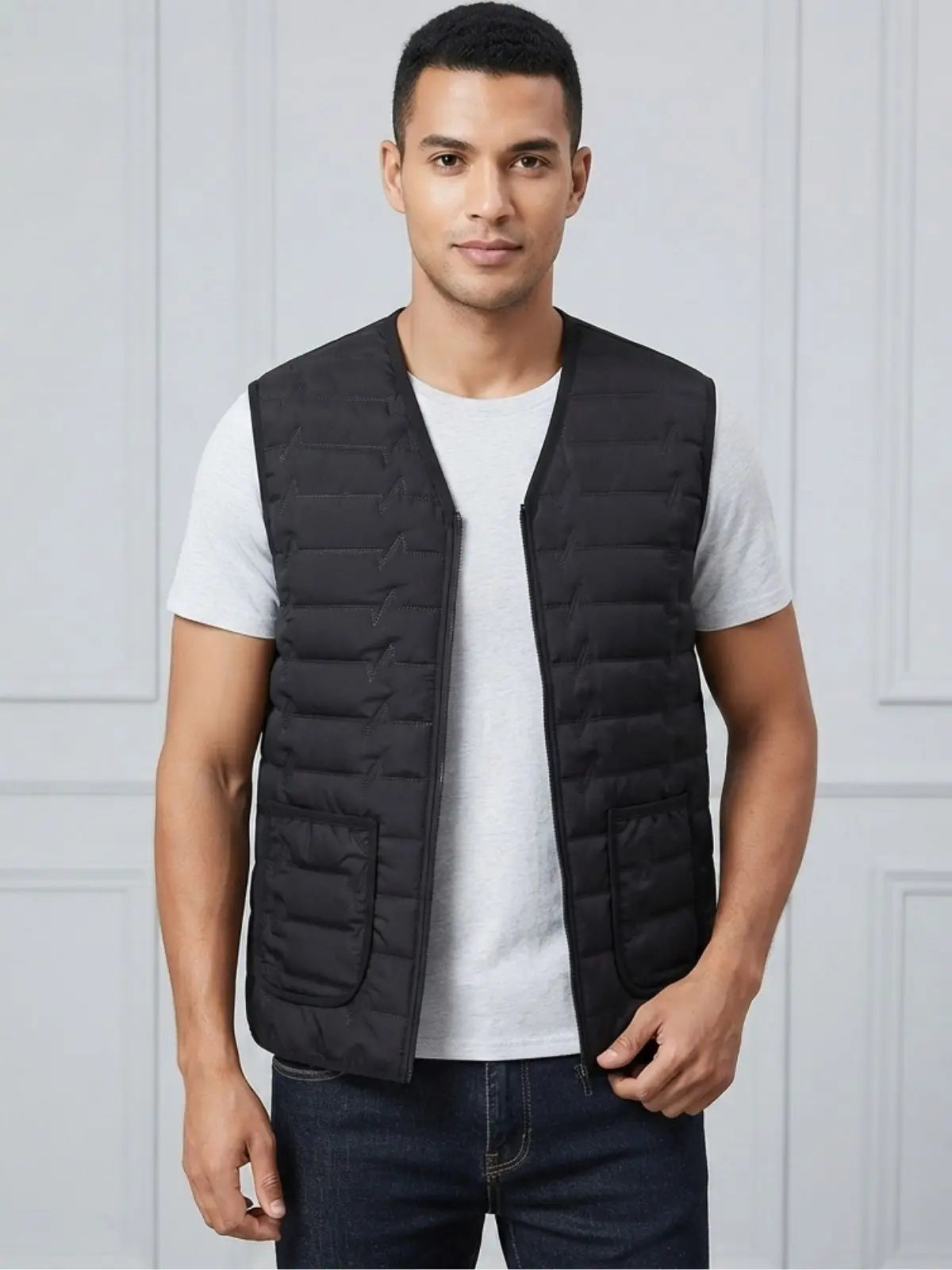 Men’s lightweight V-neck quilted vest with lightning-bolt seam details and zipper — sleeveless warm inner layer