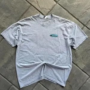 Vintage 90s Quiksilver Grey Surf Graphic Tee Grail Cotton Crewneck Tee for Vintage Coastal Style and Fall Streetwear, Unisex Crewneck Shirt for Men and Women