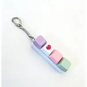 Linear-shaped stress-relief 4-key mechanical keyboard tester with macaron keycaps, stress-relief keychain toy for girls