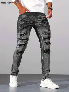 Men’s American street hip-hop layered patchwork denim jeans for spring—high-street style with a slim straight cut that blends design flair with wearability