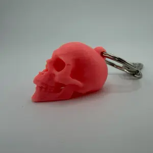 Skully Red Skull glow in the dark Keychain with Metal Clasp for Easy Attachment to Bags and Keys