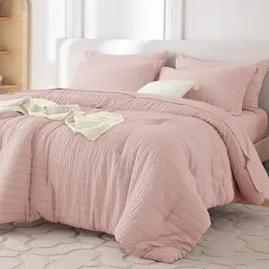 7 Pieces King Comforter Set, Seersucker Bed in a Bag King Size, All Season Luxury Bedding Set with Comforter, Flat Sheet, Fitted Sheet, Pillowcases & Shams, Rose Gold