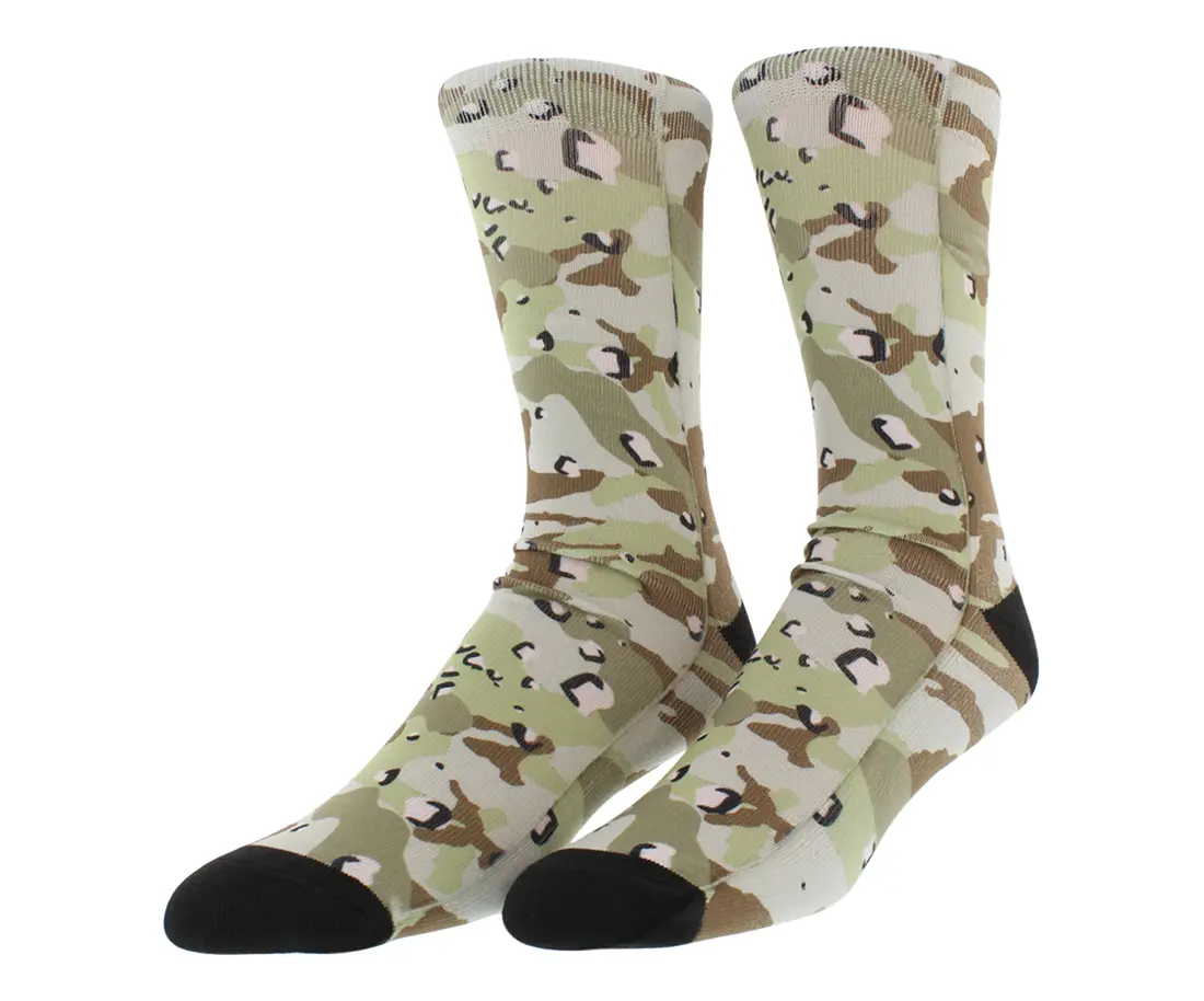 Ribbed crew socks with allover camo print design. Contrast toe and heel. Constructed with premium features and created with the most advanced sublimation printing