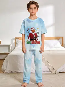 Grinch Snowflake Dream 2-Piece Set: Boys' Digital Printed Short-Sleeve Pajama Top and Long Pajama Pants, made of flame-retardant fabric. A fashionable, trendy, casual, comfortable and soft pajama set, suitable for sleeping and home leisure. 100% polyester