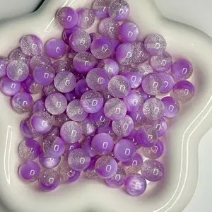 Acrylic 16mm beads with silver glitter for craft projects.