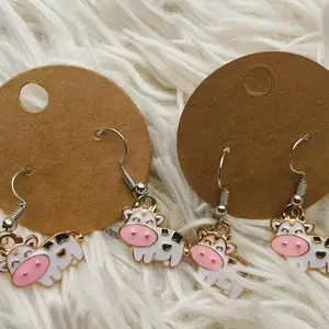 Black and white Cow hook earrings
