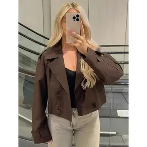 Women’s trendy cropped trench coat in dark brown, double-breasted jacket with lapel collar and belted cuffs — vintage outerwear for women’s casual streetwear