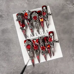 Purely handmade Gothic press-on nails - black-and-red crystal nail set featuring delicate pendants and pearl embellishments; handcrafted long false nails, Christmas limited edition