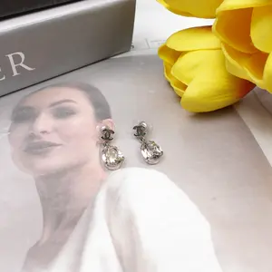 Pre-owned Chanel Gold Tone Diamond Silver Earrings T10259853