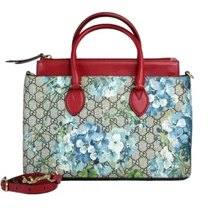 Pre-owned GUCCI Leather Top Handle Bags Linea Convertible Top Handle Bag Blooms Print GG Coated Canvas Elegant Floral Design Red Handles Versatile Everyday Use