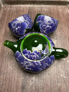 Color-Changing Green Peony Teapot Set with Golden Accents