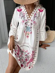 A women's printed V-neck lace spliced bell-sleeve high-waisted casual versatile dress, suitable for summer, daily casual wear, vacations, and loungewear.