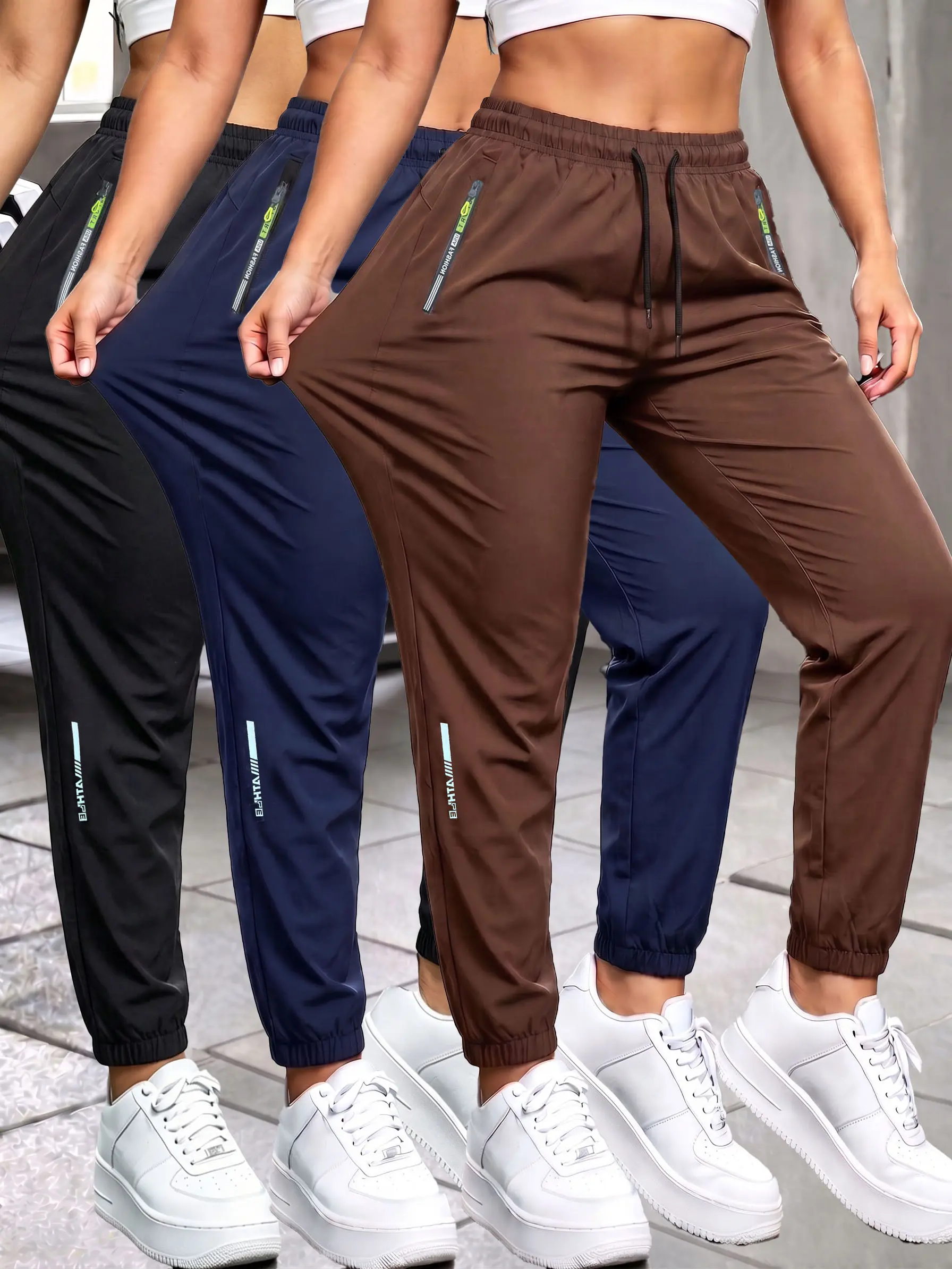 Women’s summer pants with zippered pockets and cuffed legs, featuring a stylish zipper design and an elastic waistband with an elastic band; casual outdoor everyday long pants. Womenswear