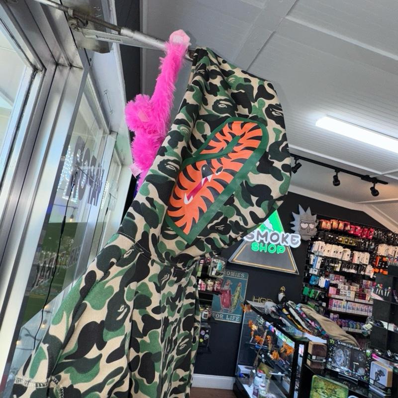 A Bathing Ape Camo Jacket with Orange Logo and Hoodie Design for Men