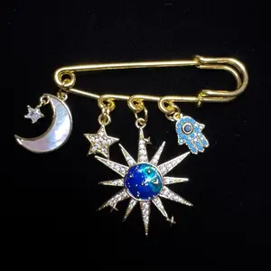 TheBigBang Brooch 2-Inch Gold-Plated Brooch Inspired by Cosmic Grandeur with Stars, Crescent Moons, Hands & Evil Eye