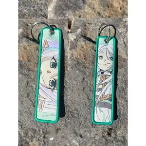 Freiren Main Collection Keychain with Character Designs and Green Accents