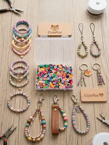 A box of mixed color soft pottery with holes for DIY jewelry making beads, loose beads, and spacer beads, suitable for making necklaces, bracelets, earrings, and other jewelry