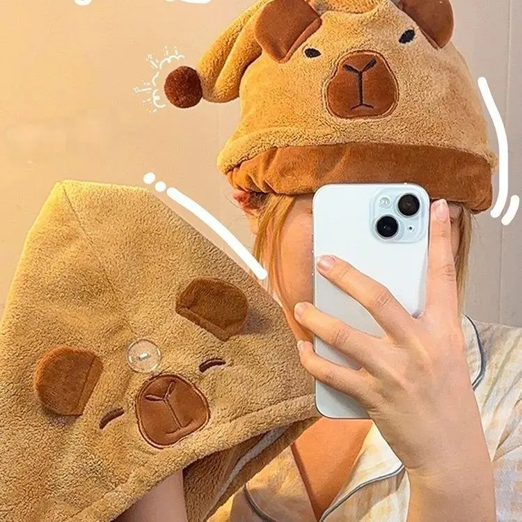 Kapibala style dry hair cap, made of soft fabric that is super skin friendly, absorbs water quickly and dries without dripping water. When put on for showering and washing hair, it instantly transforms into a cute little "water dolphin"