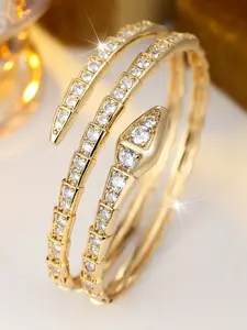 High-end, intricately adorned, snake-shaped open-faced bracelet with a touch of luxury and a unique, small-scale aesthetic, a new addition to the collection of exquisite accessories, Elegant Minimalist Bangle