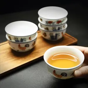Reissue “Fuxike”: Doucai chicken egg cup featuring traditional blue-and-white doucai craftsmanship. Dimensions: 6.7 cm diameter, 55 ml capacity. Ceramic Chinese gongfu tea tasting cup, single item packaging. Ideal for holiday gifting and for collectors in