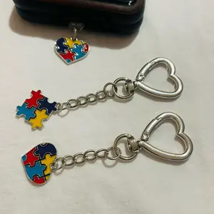 Autism acceptance keychain / dust plug
