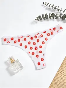 Sexy low-waisted triangle pants for ladies, white heart-shaped printed comfortable hip-hugging bikini style, lip-printed thong pants
