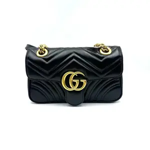 Pre-owned GUCCI hz9 GG Marmont collection small black and gold chevron quilted flap bag 71759