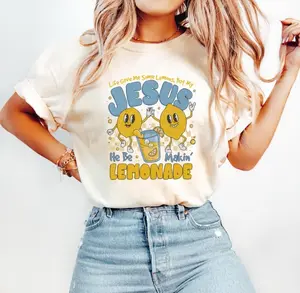 Women's Short-Sleeve Christian Top - Lady Streetwear Tee with "Life Gave Me Some Lemons But Jesus Makes Lemonade" Slogan, Faith-Inspired "God's Got My Back" Design