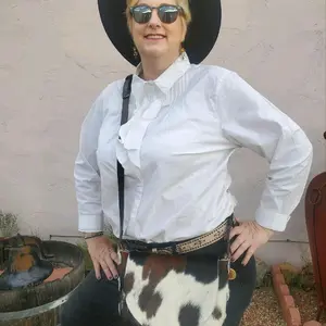 Hair On Hide Crossbody Bag - Stylish Cowhide Design with Adjustable Strap for Everyday Use. Long crossbody strap for size inclusivity.