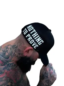 TheDriveClothing Nothing To Prove Side Style Flexfit Hat – Black Fitted Cap with White Print, Structured Mid Profile Stretch Fit Hat, Mesh Back Performance Headwear
