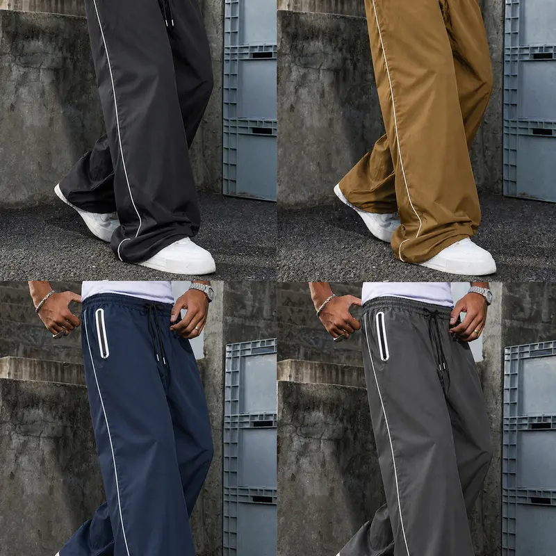 Men's Y2K nylon track pants with side stripes, elastic waistband