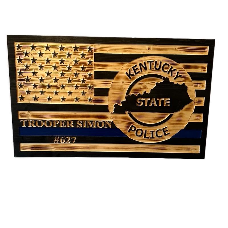 Custom engraved wooden American flags for police, firefighters, veterans or active duty military make great decor and hangable.