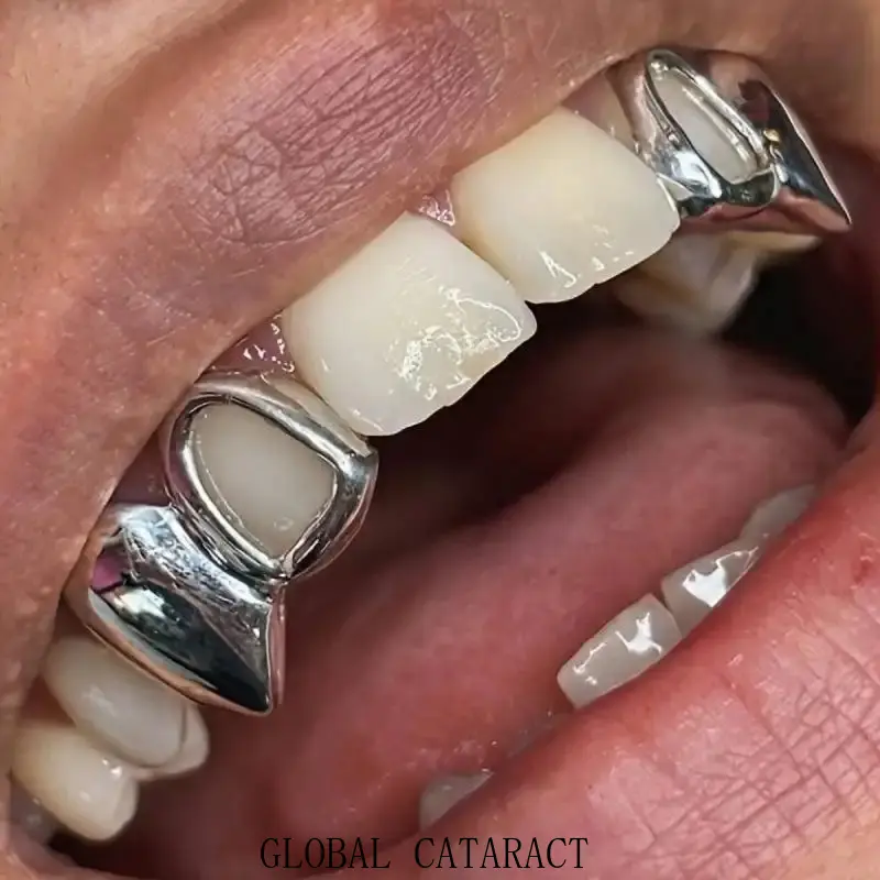 GLOBAL  2pcs/SET Hip Hop Double Fang Teeth Grillz for Teeth Golden Color Plated Canine Two Tooth Upper Top Fangs Hollow Vampire Teeth Grills Jewelry symmetry on both sides  Oral Cosmetic