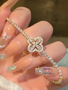 Elegant Four-Leaf Clover Bracelet with Zirconia Chain, Stylish Buckle Design for Women, Perfect for Daily Wear & Special Occasions