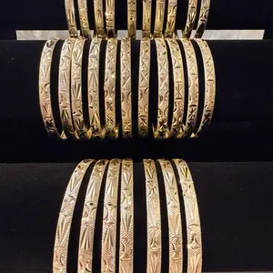 Elegant Gold Color Bangle Bracelets with Intricate Patterns for Women's Fashion Accessory