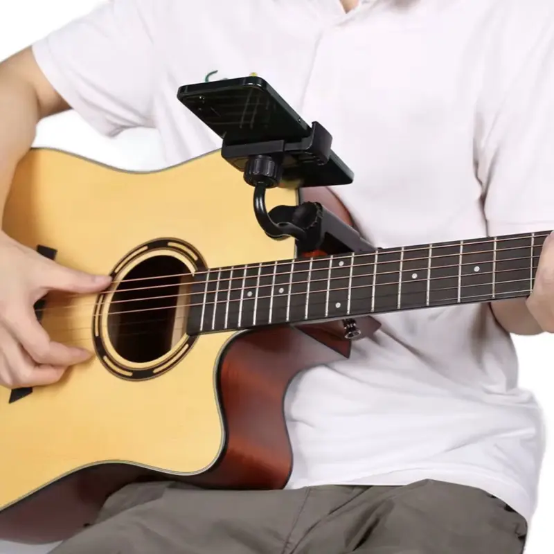 DEROMERO Snap-on Guitar Phone Holder Clamp-Based Mount for Guitars Adjustable Height Compatible with All Smartphone Models Easy to Use Guitar Camera Mount Sheet Music Stand